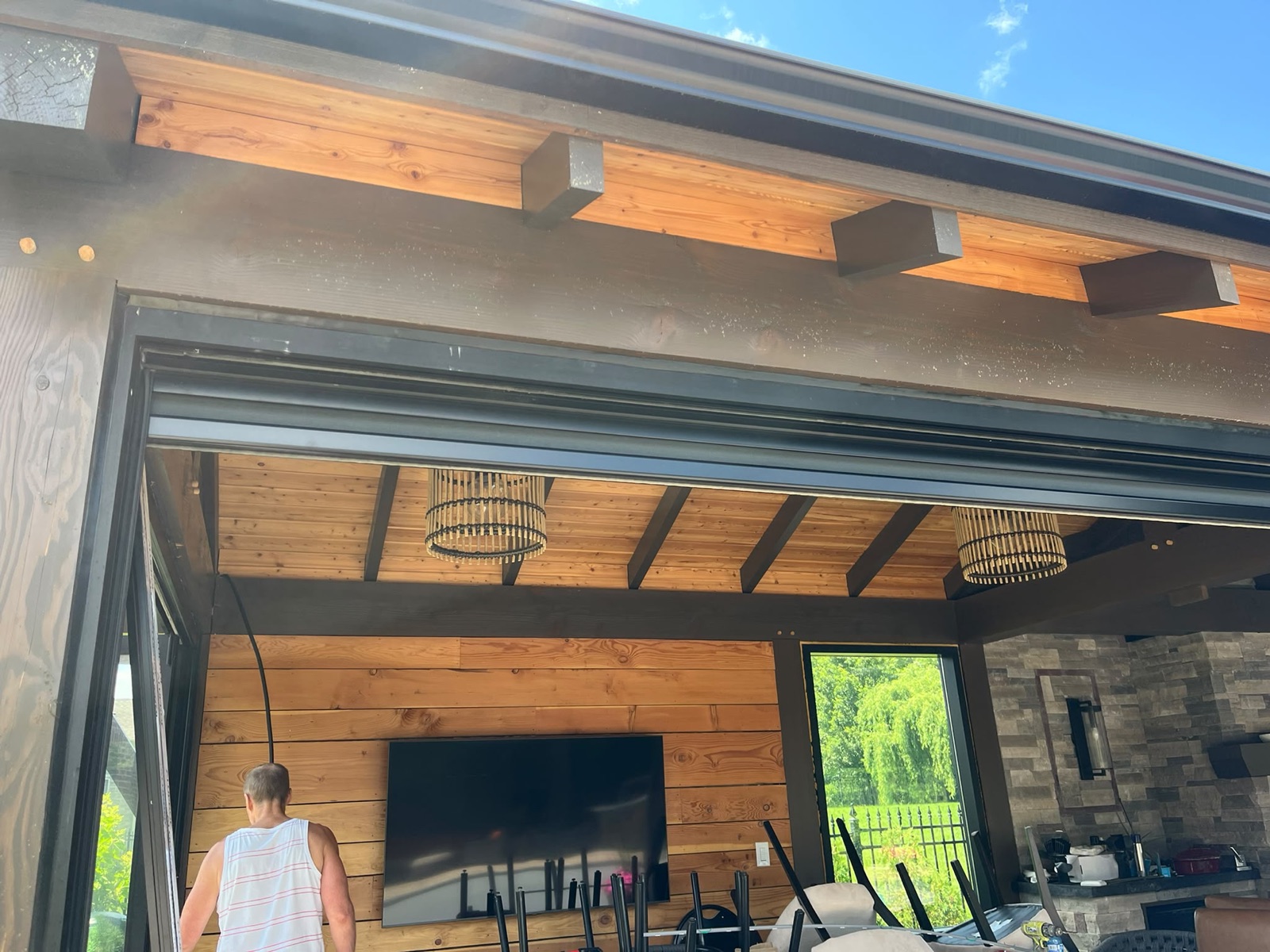 Outdoor screen system installed on a pool cabana, view 005
